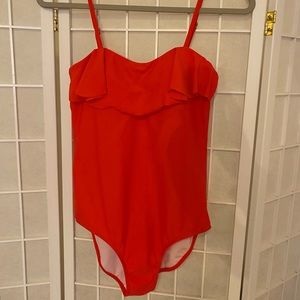 Coral one-piece swimsuit, ruffled top